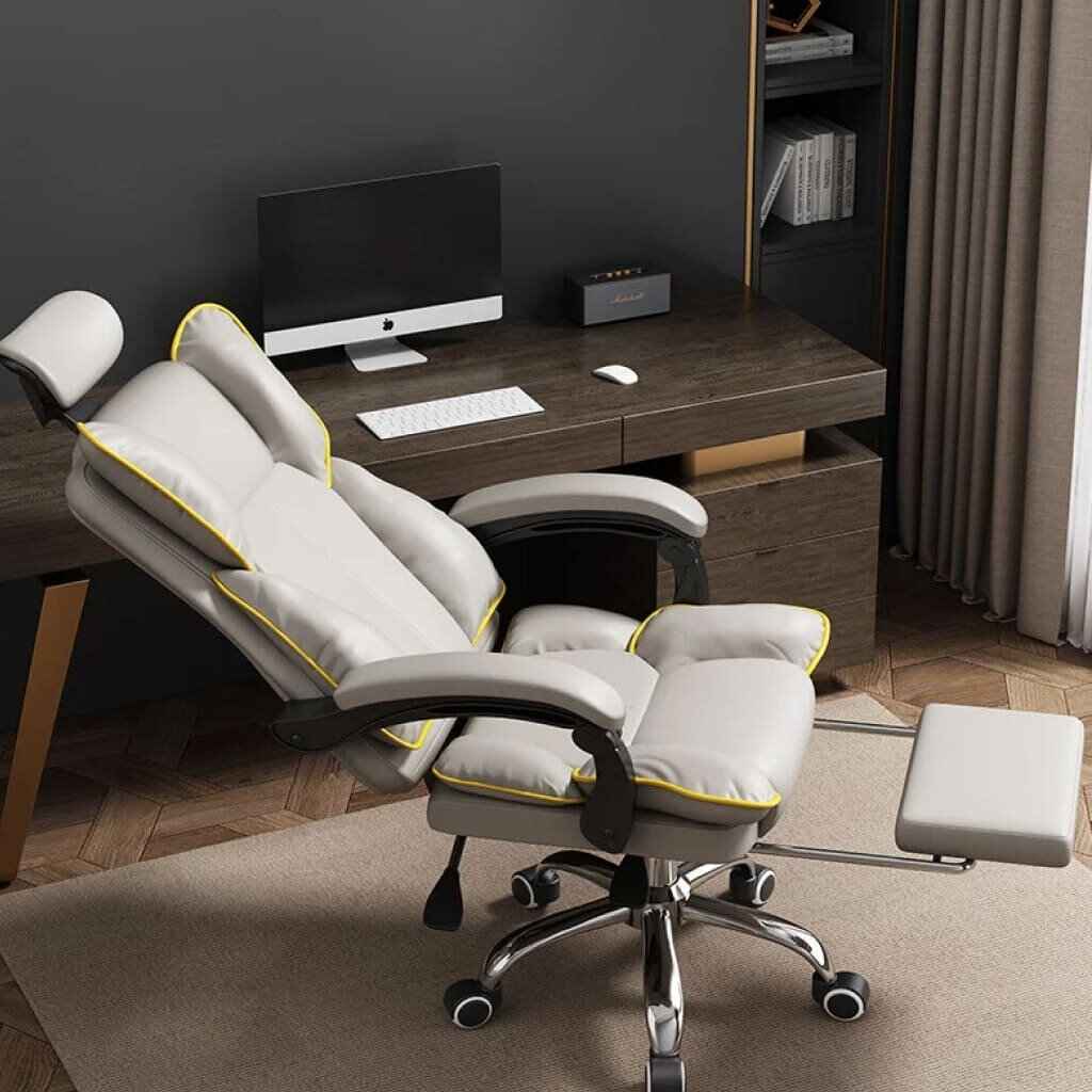 Ergonomic PU Leather Gaming Chair with Adjustable Headrest, Lumbar Support & Footrest reclined