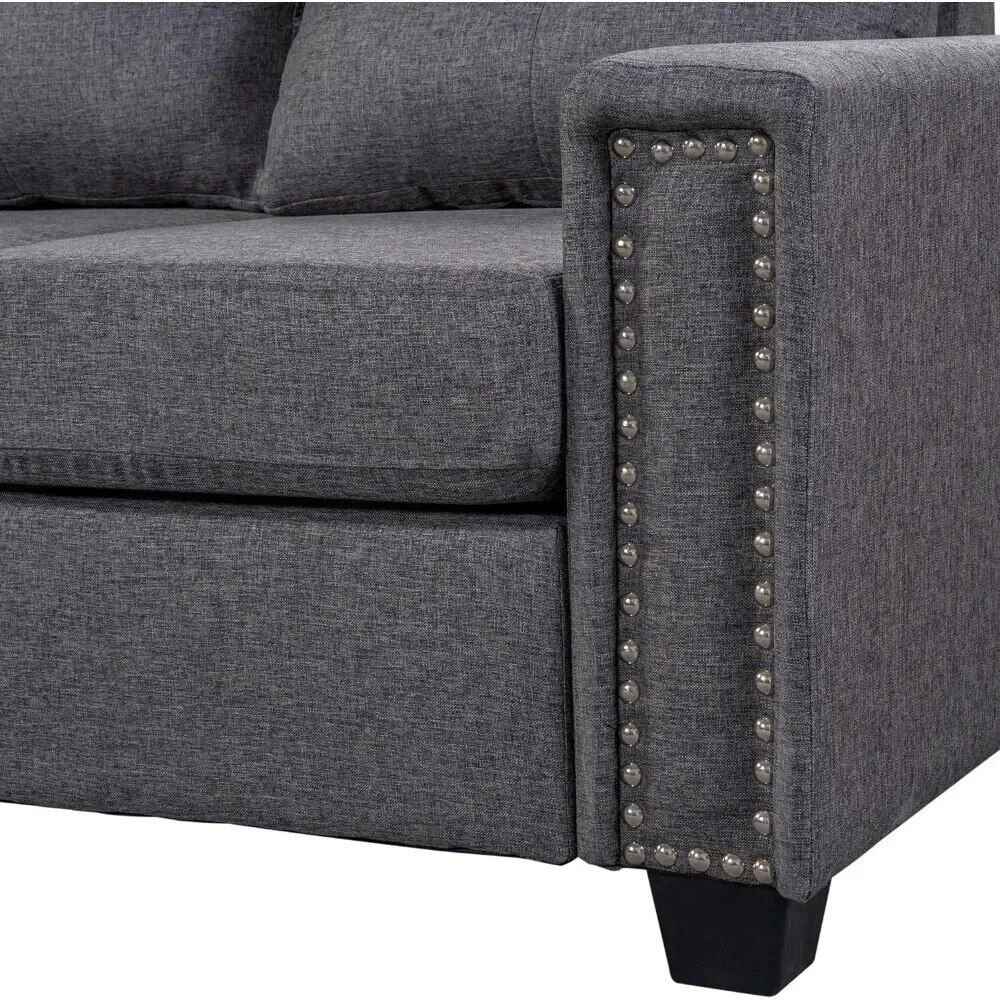 L-Shaped Sofa with Reversible Recliner and Ottoman close up